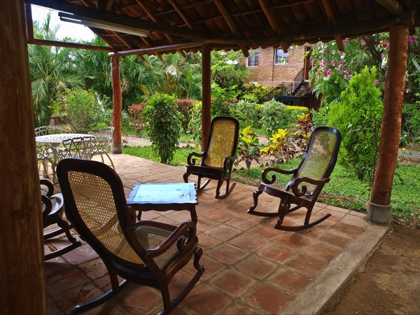 Cozy sitting areas among the lush gardens