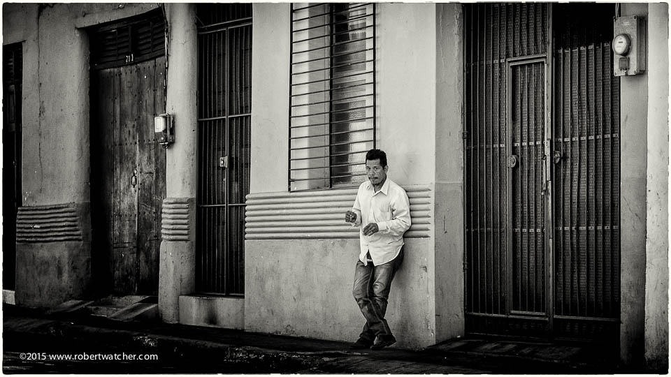 Man standing on leon street